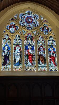 Main chapel stained glass behind altar