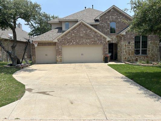 Driveway all cleaned up! Removed black algae, and bulk of the oil stains