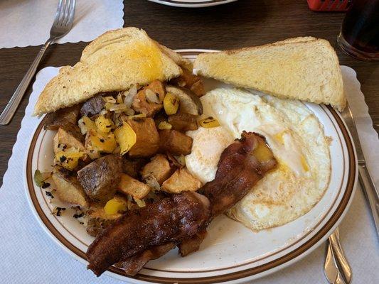 2 eggs, 2 bacon, sourdough, and country fries