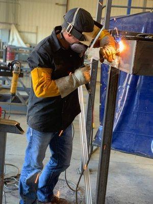 Justin fabricating metal stairs