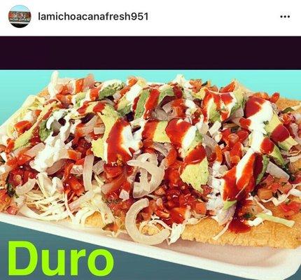 Come try the duro! It has cueritos, sour cream, lettuce, tomato, onion, Japanese peanuts, Valentina, chamoy, Tajín, lemon!