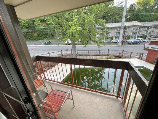 Balcony overlooking pool (spring before pool season/cleaning)