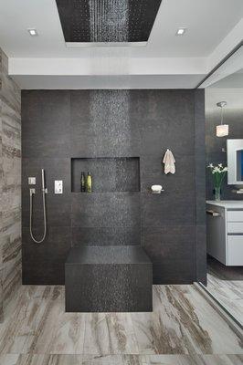 Massive multi-setting rain showerhead promises a natural spa-like retreat...
 -photography by Anice Hoachlander