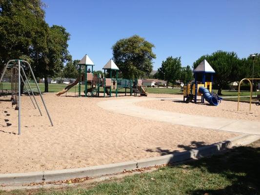 Playground has sand and bathroom nearby.