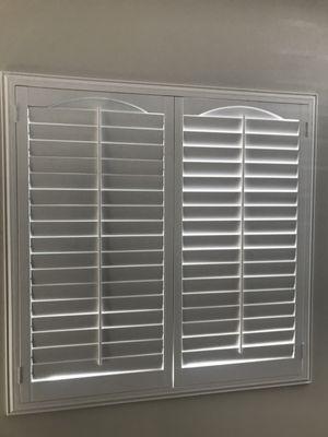 Plantation Shutter with outside mount and liberty bell top.