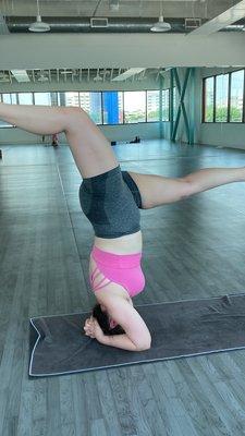 Headstand progress in the sun room of the studio.