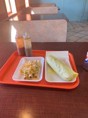 Carne asada burrito & 3 Guacamole with Cheese Tacos