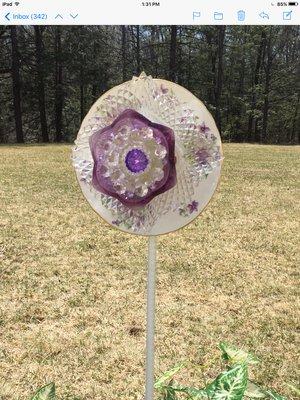 This flower is weather resistant, handmade out of vintage crystal China and cut glass. See more on FB Susan Sargent stgermain