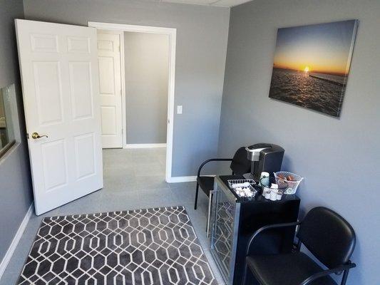 The new waiting room is complete with cold water and hot coffee.