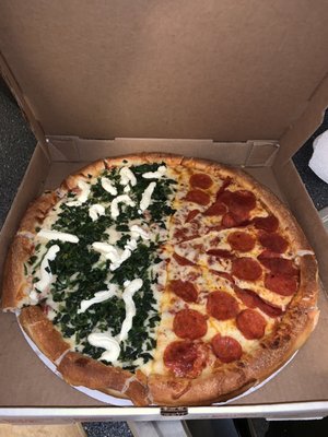 Half spinach and ricotta (left) and pepperoni (right) pizza