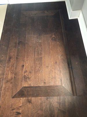 Hardwood Flooring install we did in Charlestown Indiana with a basement door in floor.