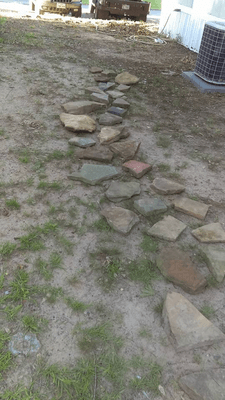 stone walkway job #2 not allowed to beak ground or add sand and boarders around the walkway so it is and remains in finished until notice