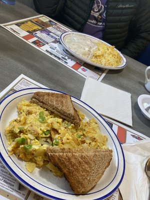 Biscuits&gravy, has browns 3 egg, home fries, onion, pepper scramble