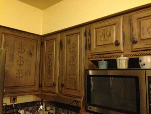 We can update oak cabinets with a durable, long lasting paint/ stain treatment.