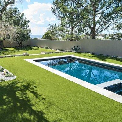 Nothing looks better than artificial grass around your swimming pool.