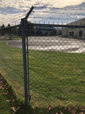 Example of commercial fencing at Natural Organics on Aircenter Circle in Reno