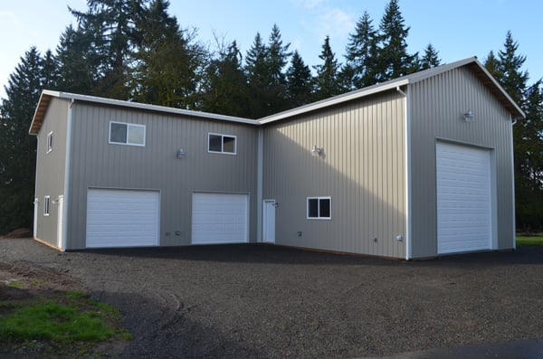 RV storage garage with attached 2 story shop space and apartment above.