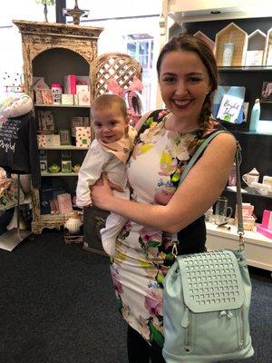 Brittany and Nicolette displaying our favorite purse