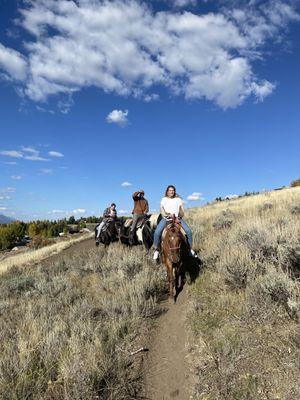 Trail riding with a view of the Tetons