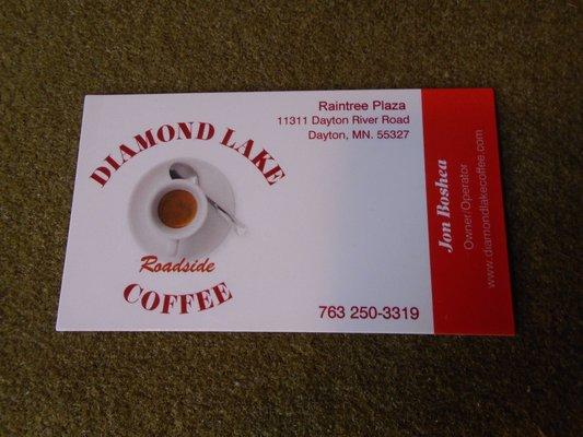 Business card with contact info.