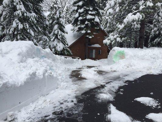 Came by again after some more snow fell and removed the berm the snow plow piled infront of the driveway.