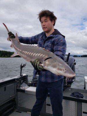 The biggest sturgeon of the day fishing with EastFork Outfitters.