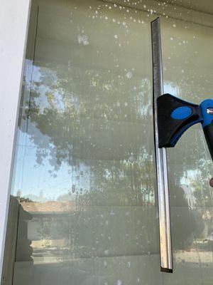 Squeegee window cleaning