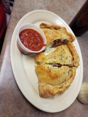 Pepperoni and sausage calzone