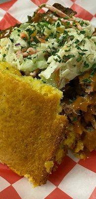 "Pulled Pork & Cornbread"
Topped with LE'POUGH'S SAUCE and mango coleslaw.