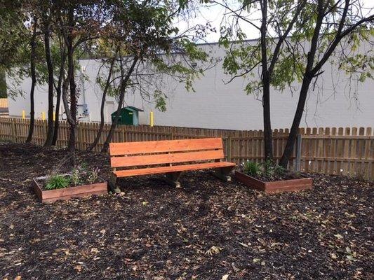 A bench from the Nora Corners Pocket Park