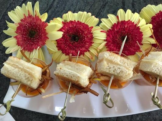 Carrot Ginger Soup topped with frizzled leeks and prove cheese grilled sandwich