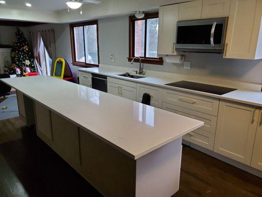 this is another  picture of the long  kitchen with  white  quartz  Carrera marmi