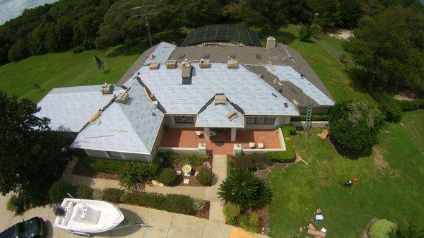 Beautiful home having the roof replaced by Axiom Contracting Group.