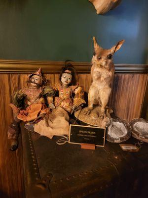 Taxidermy springhare alongside two beautifully creepy dolls