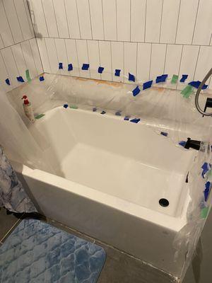 APTARTMENT tub was replaced and The Grout Medic came in after to replace the wall tile (before picture)