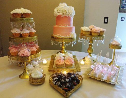 Dessert buffet for baby shower.