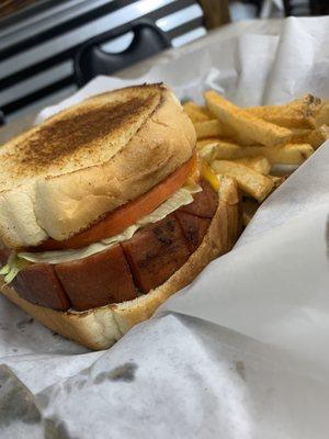 Smoke Bologna Sandwich with home fries.