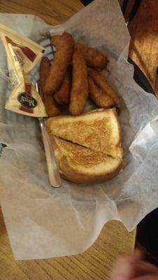 A humble, but delicious, grilled cheese and some killer fried pickles!