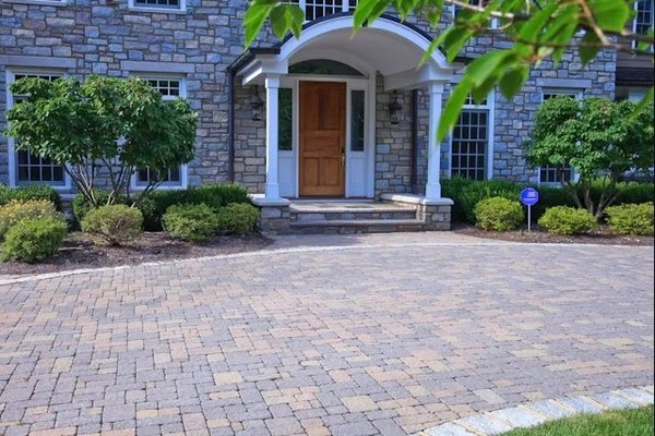 Concrete cobble paver driveway.