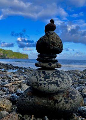 Rock Stacking on a stone beach in Kipahulu