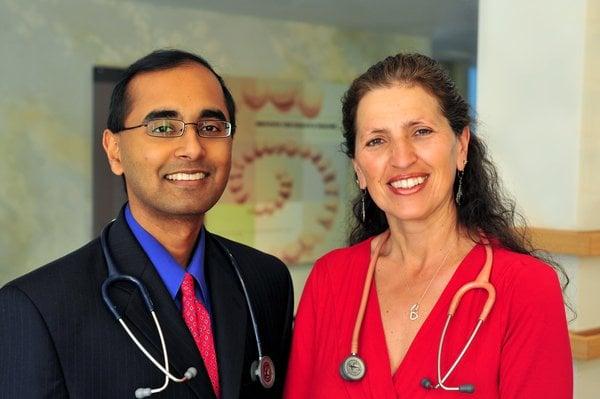 Holistic physicians Akil Palanisamy, MD and Michelle Perro, MD, DHom