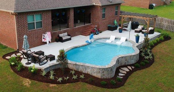 Beautiful Gunite Pool with flagstone retaining wall