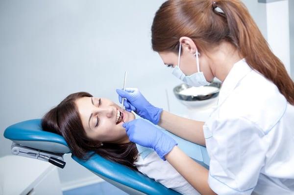 Services include fillings, extractions, root canals, bridges, crowns, and more.