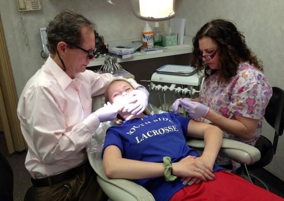 Dr. Halberstadt with a young patient