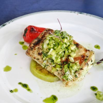 GRILLED MAHI
 Seasoned with Garlic, Lime and Cilantro Topped with Green Tomato Salsa, Served with Coleslaw and Choice of One Side.