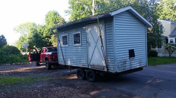 Shed 8'x16' transported to it's new home safely rates variy for items like sheds or oversized loads and equipment