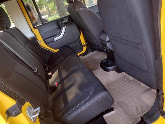 Back seat detail, and carpet detail.