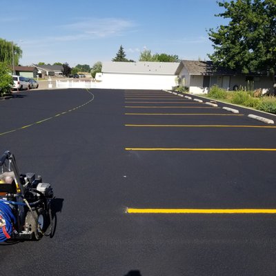 Sealcoating a parking lot in Boise, Idaho