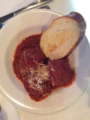 Meatballs and garlic bread.