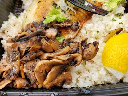 Tilapia with mushrooms over Rice